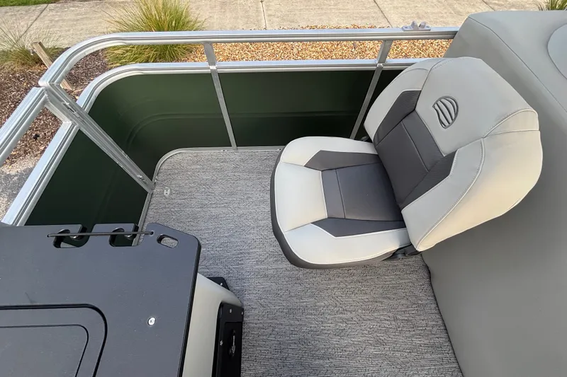 Slide: The Image of 2027 Sun Tracker Fishin' Barge 20 DLX boat seat with gray upholstery. - 13