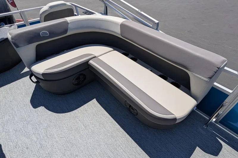 Slide: The Image of 2027 Sun Tracker Bass Buggy 18 DLX pontoon boat seating, featuring gray and beige upholstery. - 80