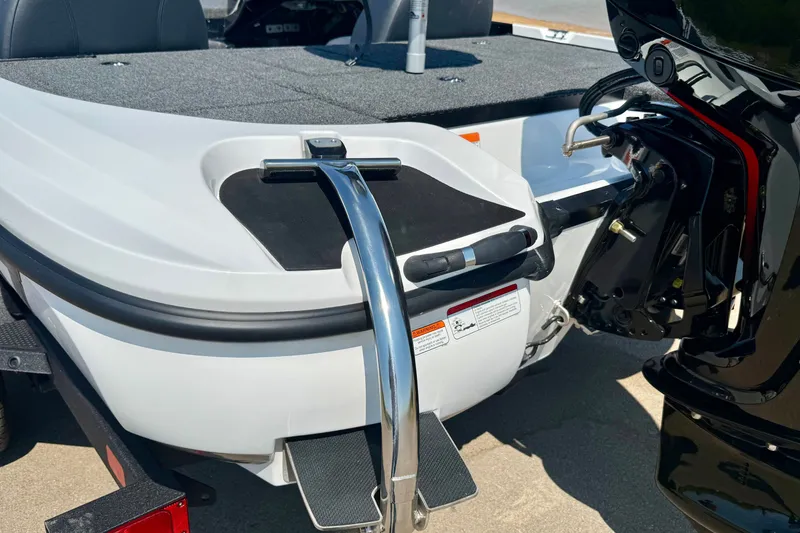 Slide: The Image of Rear view of 2027 Nitro Z17 boat with motor and swim platform. - 17
