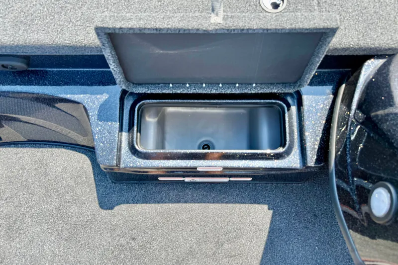 Slide: The Image of Open storage compartment in 2027 Nitro Z17 boat, featuring sleek design and durable materials. - 8