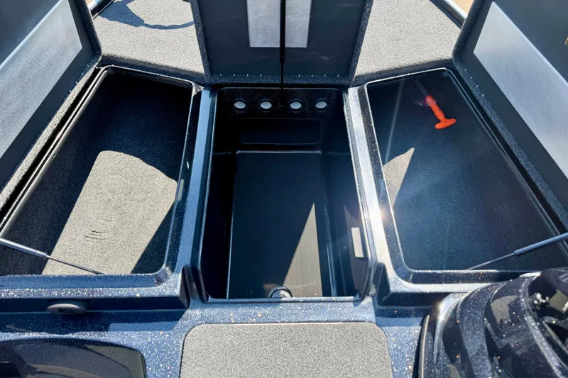 Slide: The Image of Open storage compartments on a 2027 Nitro Z17 boat, showcasing spacious interior design. - 7