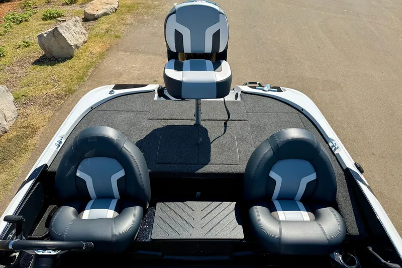 Slide: The Image of Nitro Z17 2027 boat interior with three cushioned seats, gray and white design. - 9