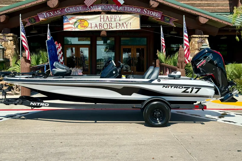 Slide: The Image of 2027 Nitro Z17 boat displayed outside Texas outdoor store, celebrating Labor Day. - 1
