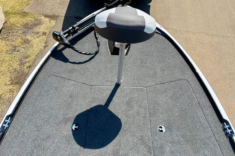 Slide: The Image of Front deck of a 2027 Nitro Z17 boat with a seat and trolling motor. - 6