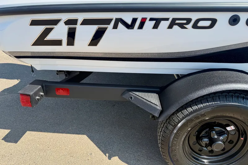 Slide: The Image of 2027 Nitro Z17 boat trailer with logo and tire detail. - 16
