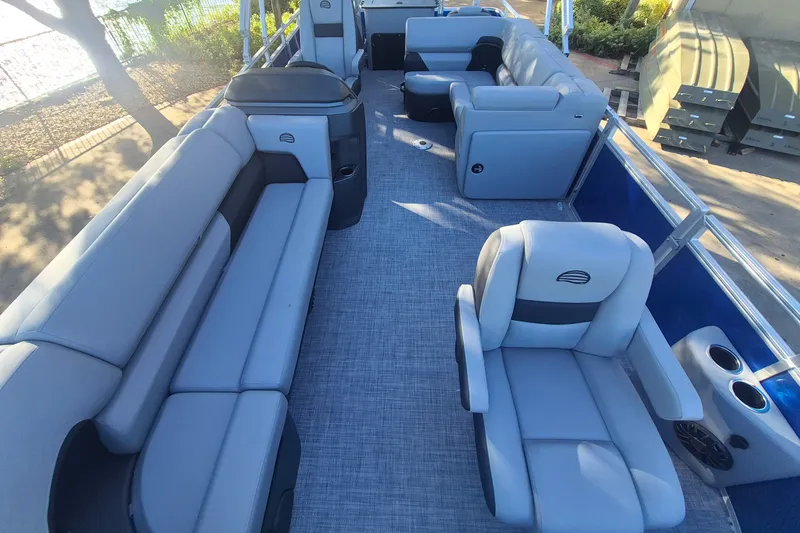 Slide: The Image of Interior of 2027 Sun Tracker SportFish 20 DLX pontoon boat with plush seating. - 15