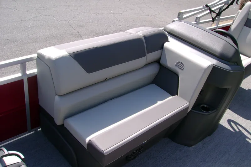Slide: The Image of 2027 Sun Tracker Fishin' Barge 22 DLX boat seating area with gray upholstery. - 13