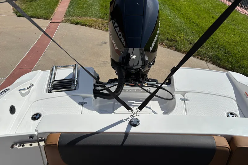 Slide: The Image of 2027 Tahoe 2150 boat with Mercury engine, featuring a swim platform and ladder. - 13