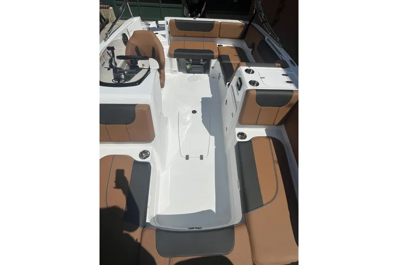 Slide: The Image of Modern Tahoe 1950 boat interior, 2027 model, featuring brown and gray seating with a sleek design. - 6