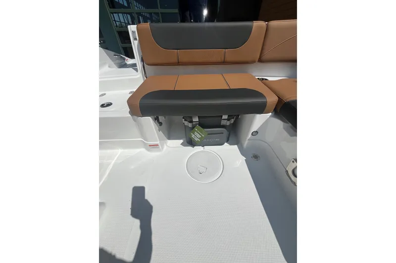 Slide: The Image of Brown and black seating on a 2027 Tahoe 1950 boat, showcasing modern design. - 9