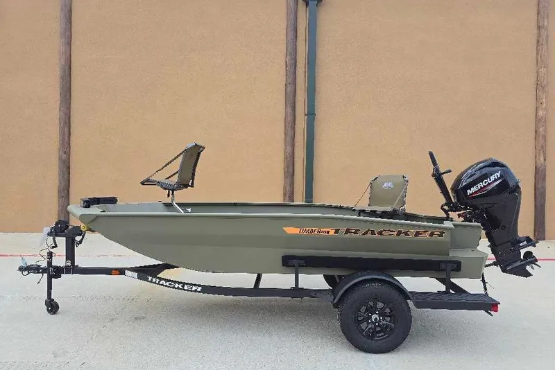 The Image of 2027 Tracker Grizzly 1553 Timber boat with Mercury outboard motor on trailer. - 0
