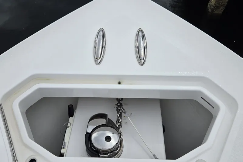 Slide: The Image of Bow anchor compartment of 2018 Invincible 39 Open Fisherman boat. - 16