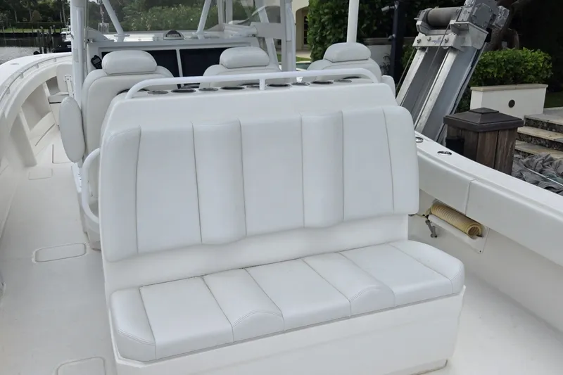 Slide: The Image of 2018 Invincible 39 Open Fisherman boat with white seating and helm station. - 17