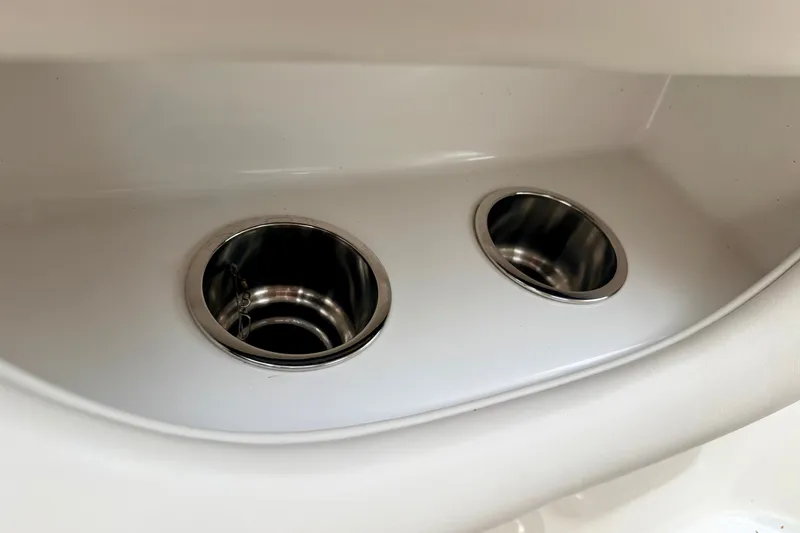 Slide: The Image of Cup holders in a 2006 Chaparral Sunesta 216 boat interior. - 56