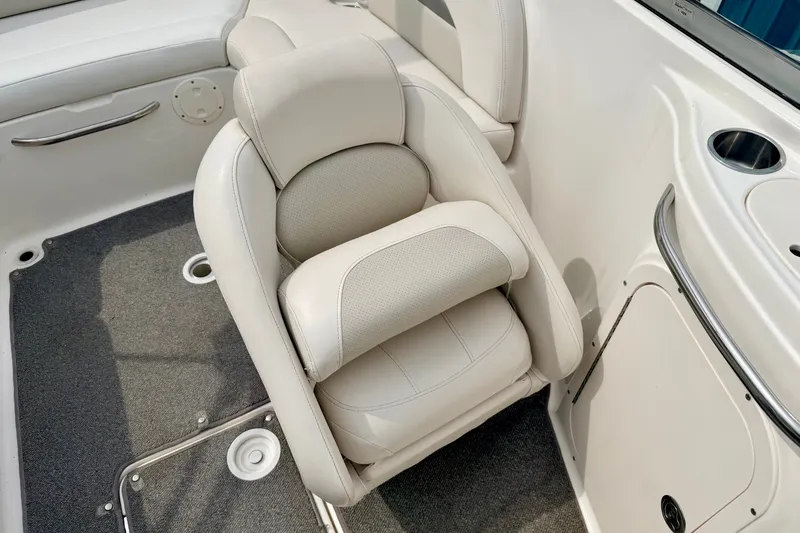 Slide: The Image of 2006 Chaparral Sunesta 216 boat interior with plush seating and cup holder. - 41