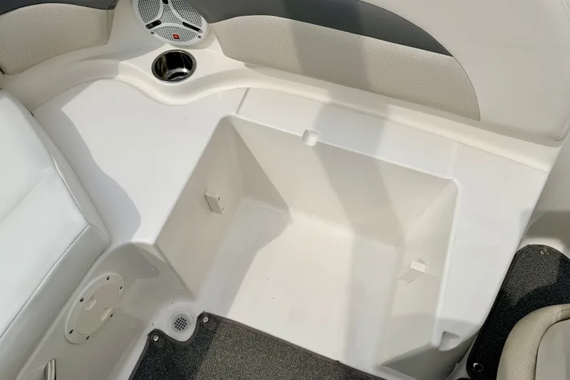 Slide: The Image of 2006 Chaparral Sunesta 216 boat interior with speaker and cup holder. - 39