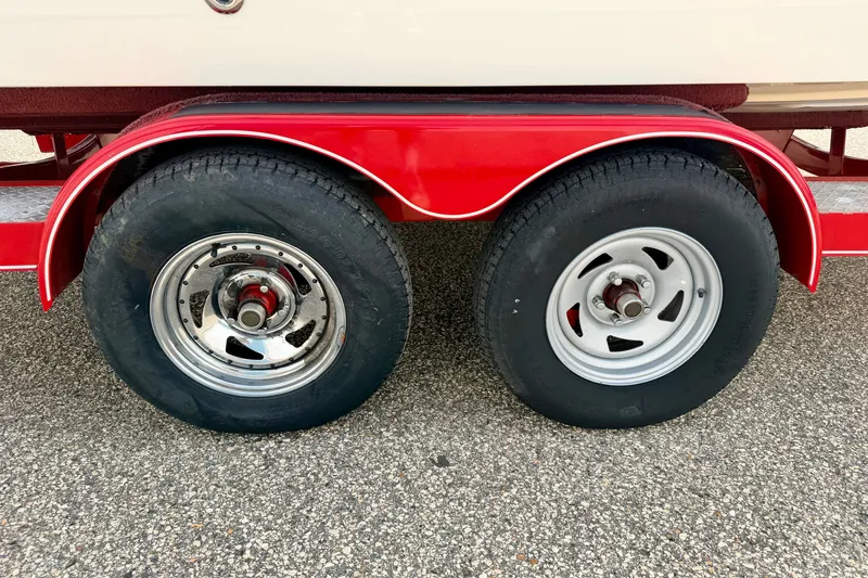 Slide: The Image of Red trailer with dual wheels for 2006 Chaparral Sunesta 216 boat. - 88