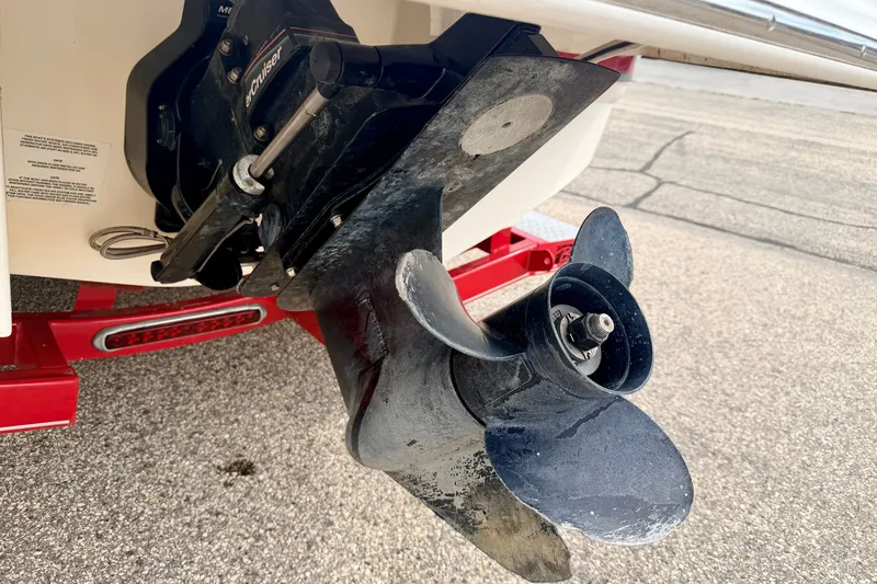 Slide: The Image of Close-up of a 2006 Chaparral Sunesta 216 boat propeller on a red trailer. - 20