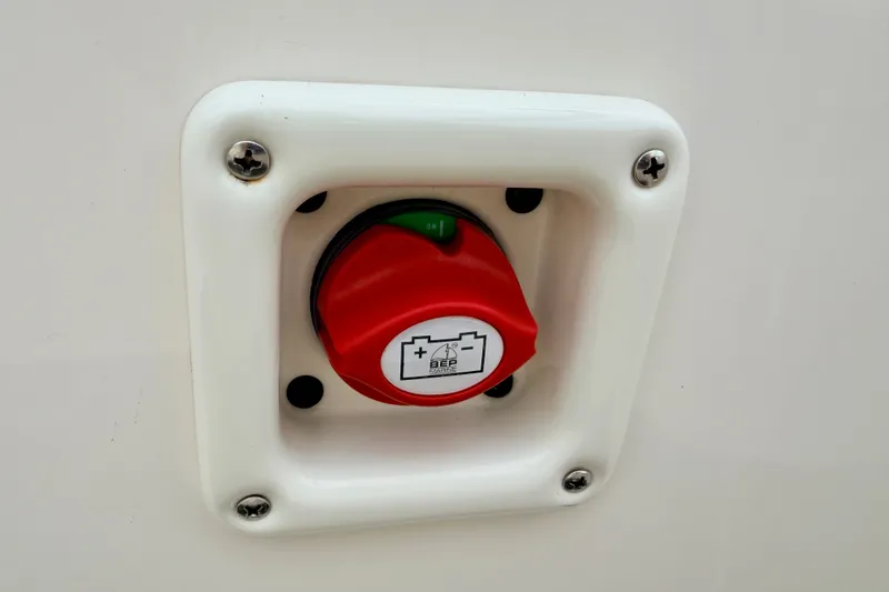 Slide: The Image of Red battery switch on 2006 Chaparral Sunesta 216 boat. - 31