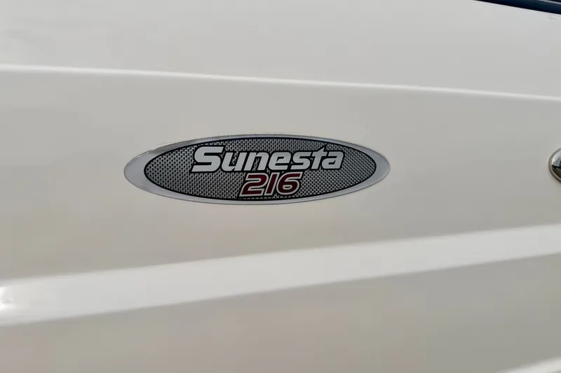 Slide: The Image of 2006 Chaparral Sunesta 216 logo on boat exterior. - 16