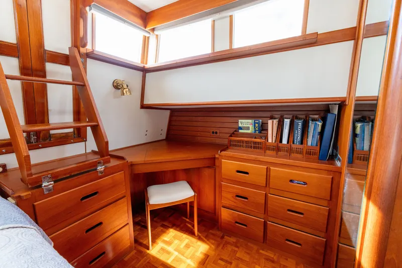 Slide: The Image of Cozy wooden interior of 1998 Grand Banks 46 Classic yacht with desk and storage. - 42