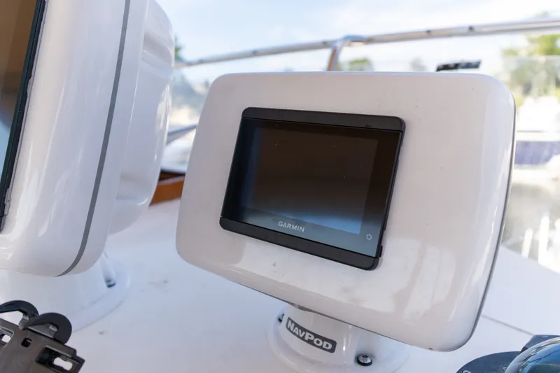Slide: The Image of Garmin navigation display on 1998 Grand Banks 46 Classic yacht dashboard. - 83