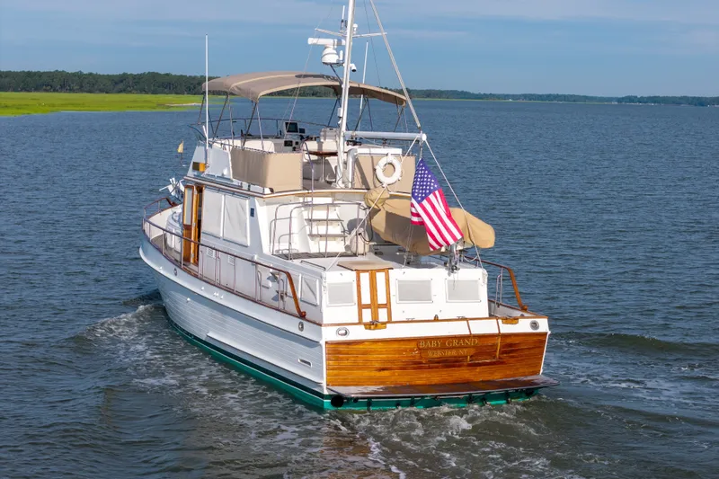 Slide: The Image of Grand Banks 46 Classic yacht cruising on open water, 1998 model. - 93