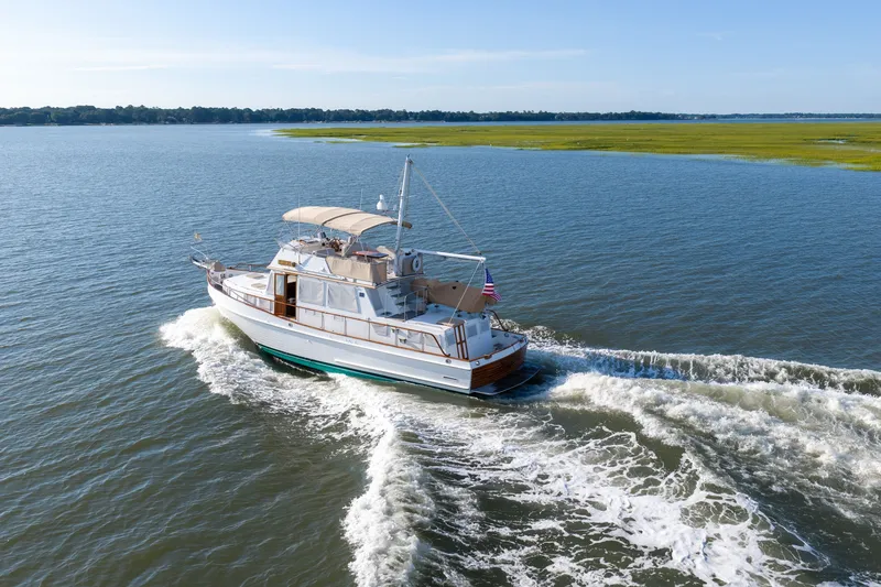 Slide: The Image of Grand Banks 46 Classic yacht cruising on open water, 1998 model. - 105