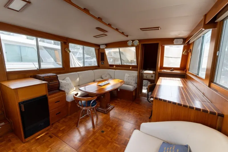Slide: The Image of Luxurious interior of a 1998 Grand Banks 46 Classic yacht with elegant wood finishes. - 20