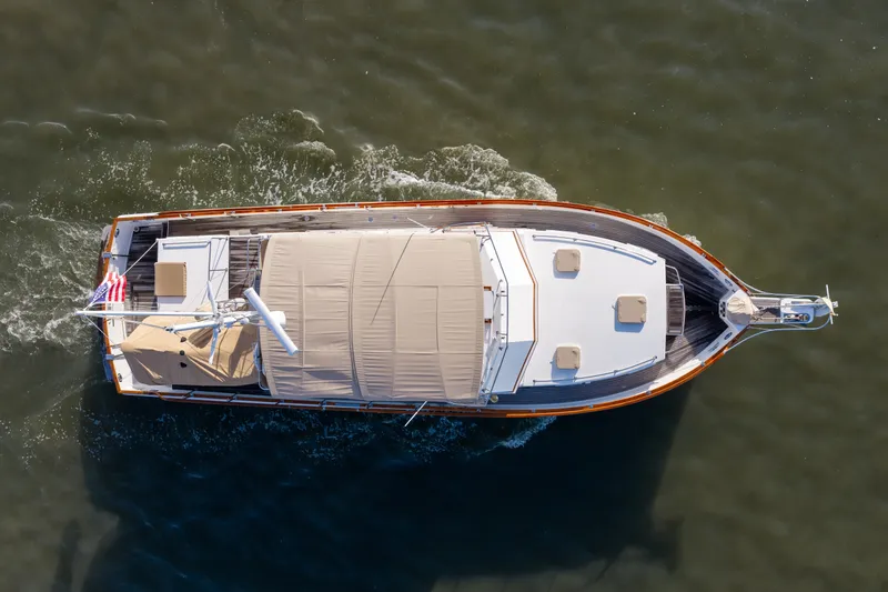 Slide: The Image of Aerial view of 1998 Grand Banks 46 Classic yacht cruising on water. - 92