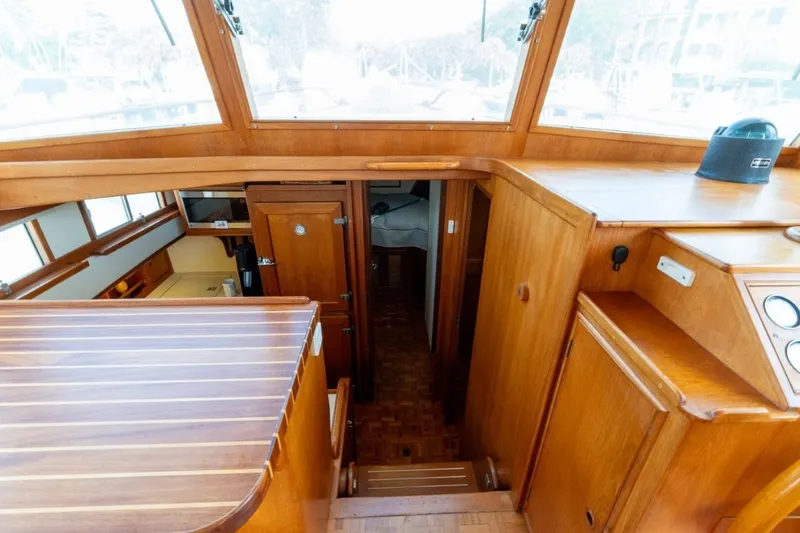 Slide: The Image of Interior view of 1998 Grand Banks 46 Classic yacht with wooden cabinetry and stairs. - 31
