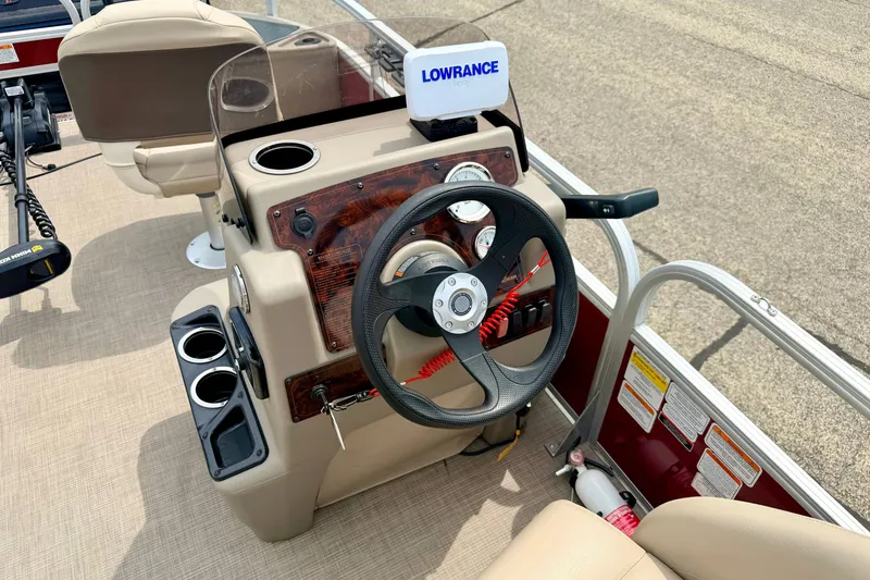 Slide: The Image of 2022 Sun Tracker Bass Buggy 18 DLX steering console with Lowrance fish finder. - 39