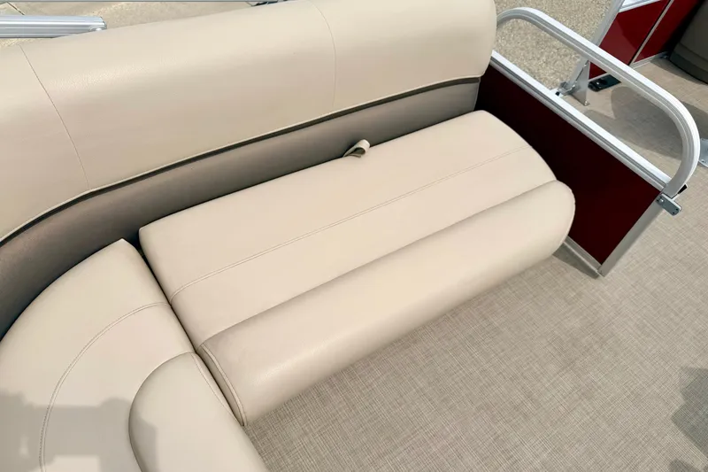 Slide: The Image of 2022 Sun Tracker Bass Buggy 18 DLX boat seat with beige upholstery and metal railing. - 35