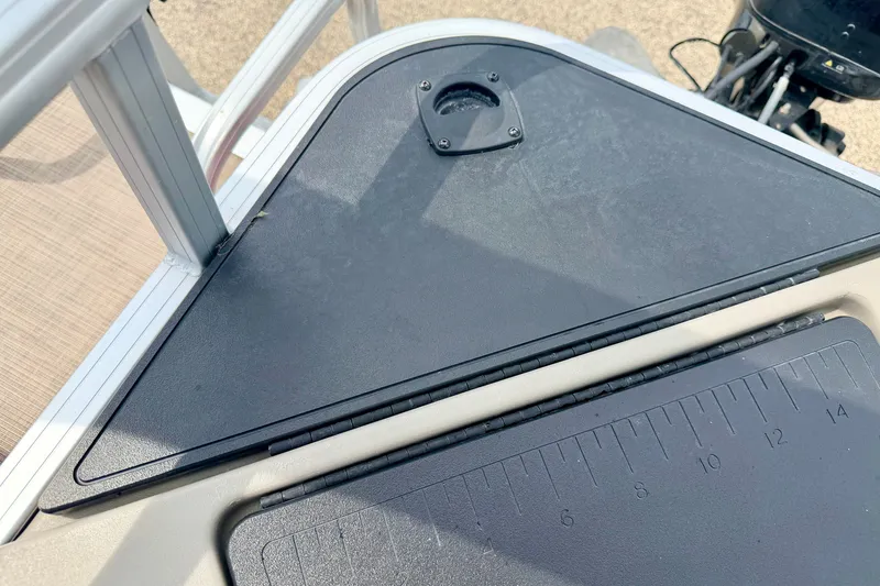 Slide: The Image of 2022 Sun Tracker Bass Buggy 18 DLX boat deck with measuring scale and motor mount. - 26