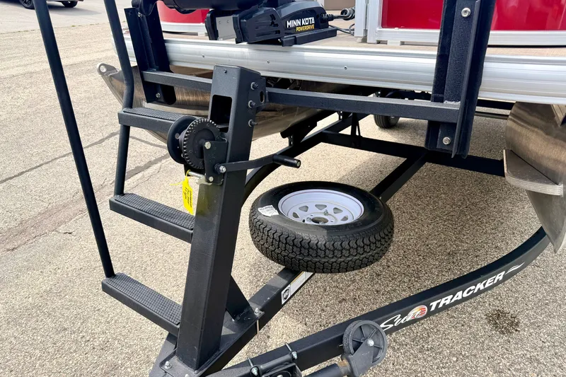 Slide: The Image of 2022 Sun Tracker Bass Buggy 18 DLX trailer with Minn Kota motor and spare tire. - 71
