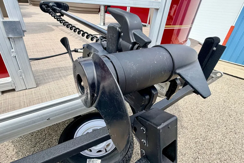 Slide: The Image of 2022 Sun Tracker Bass Buggy 18 DLX boat motor detail on trailer. - 69
