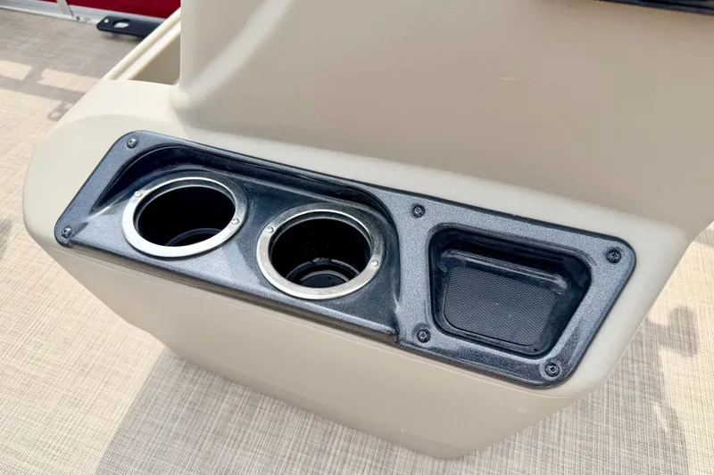 Slide: The Image of Cup holders and storage compartment on 2022 Sun Tracker Bass Buggy 18 DLX boat. - 46