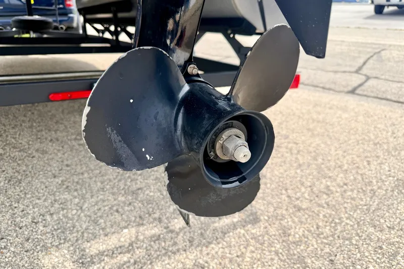 Slide: The Image of Propeller of 2022 Sun Tracker Bass Buggy 18 DLX on trailer. - 16