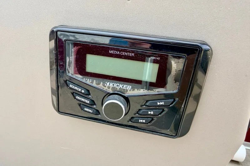 Slide: The Image of Kicker media center on 2022 Sun Tracker Bass Buggy 18 DLX boat dashboard. - 45