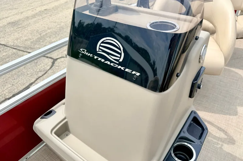 Slide: The Image of 2022 Sun Tracker Bass Buggy 18 DLX console with cup holders and windshield. - 48