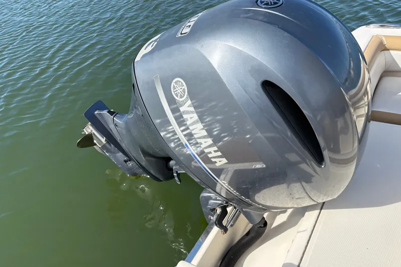 Slide: The Image of Yamaha outboard motor on 2014 Scout 225 XSF boat in water. - 35
