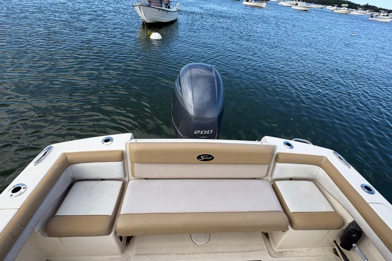 Slide: The Image of 2014 Scout 225 XSF boat with Yamaha 200 engine on calm water. - 11