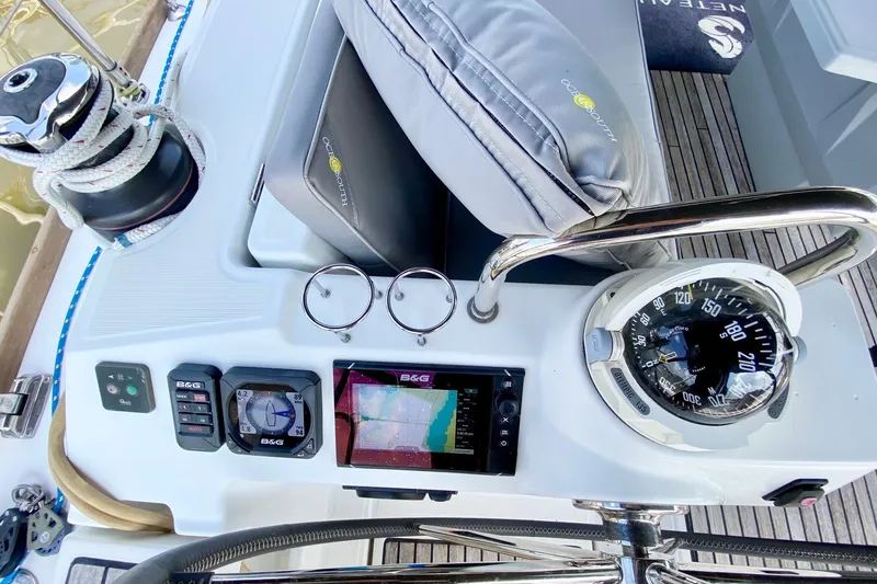 Slide: The Image of Cockpit of 2016 Beneteau Oceanis 41 with navigation instruments and compass. - 21
