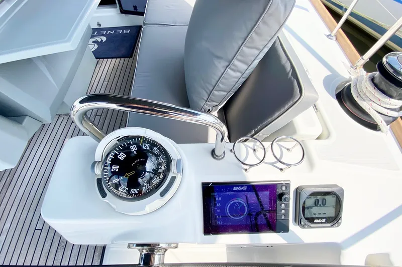 Slide: The Image of Cockpit of 2016 Beneteau Oceanis 41 sailboat with compass and navigation instruments. - 22