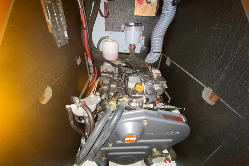 Slide: The Image of Engine compartment of a 2016 Beneteau Oceanis 41 sailboat, featuring a Yanmar engine. - 51