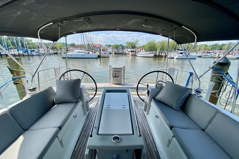 Slide: The Image of Cockpit view of 2016 Beneteau Oceanis 41 sailboat docked at marina. - 17