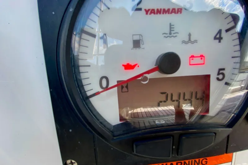 Slide: The Image of Close-up of Yanmar engine gauge on 2016 Beneteau Oceanis 41 sailboat, displaying 2444 hours. - 23
