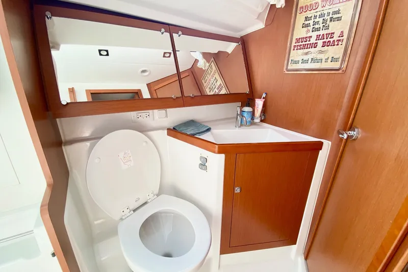 Slide: The Image of Bathroom interior of 2016 Beneteau Oceanis 41 yacht with mirror and sink. - 47
