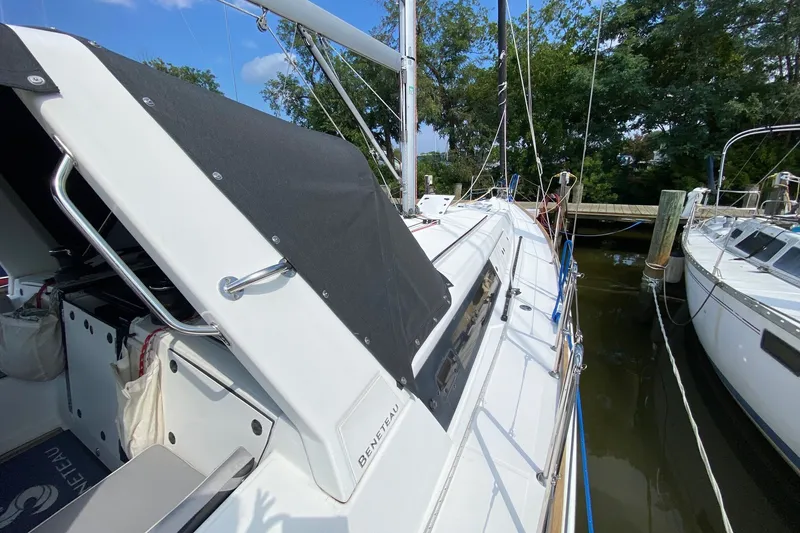 Slide: The Image of 2016 Beneteau Oceanis 41 sailboat docked, featuring sleek design and modern fittings. - 15
