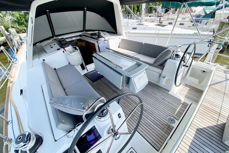 Slide: The Image of Spacious cockpit of 2016 Beneteau Oceanis 41 sailboat with dual steering wheels. - 18